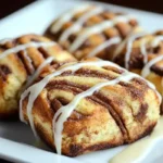 Sourdough cinnamon rolls with cinnamon swirls and vanilla glaze.