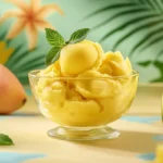 AIP mango sorbet garnished with mint.